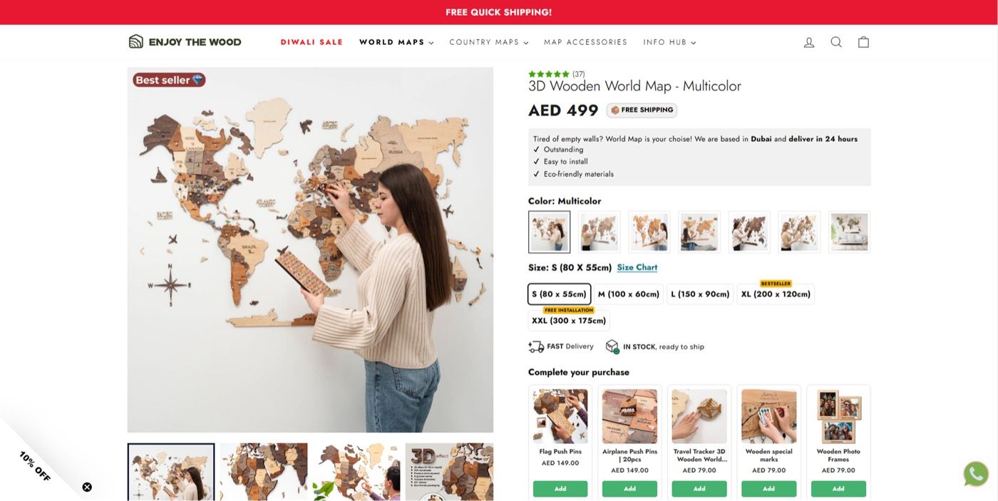 Enjoy The Wood product page for a multicolor wooden map with colour and size pickers and a Complete your purchase row.